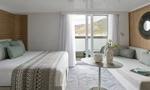 Wohn- und Schlafbereich Deluxe Suite auf dem Ponant Expeditionsschiff Le Bellot