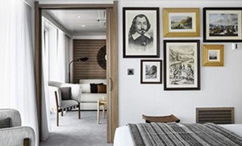 Schlafzimmer mit Blick ins Wohnzimmer Owner Suite auf dem Ponant Expeditionsschiff Le Bellot