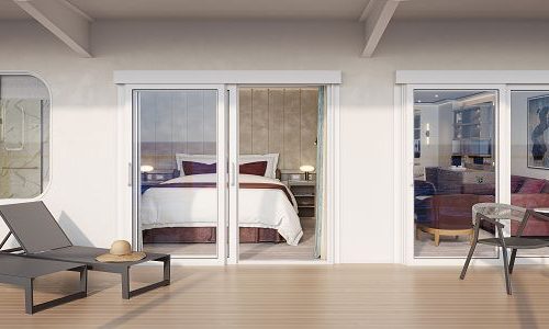 Signature Suite Terrasse mit Liegen und Blick in Suite